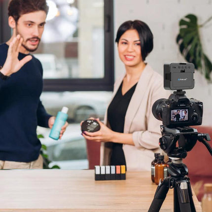 PULUZ 100 LED Fill Light for Camera and Video Photography mounted on camera lighting two presenters demoing skincare products