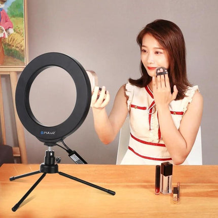 PULUZ Ring Light for Everyday Home Video Recording and Vlogging showing creator using ring light for makeup tutorial