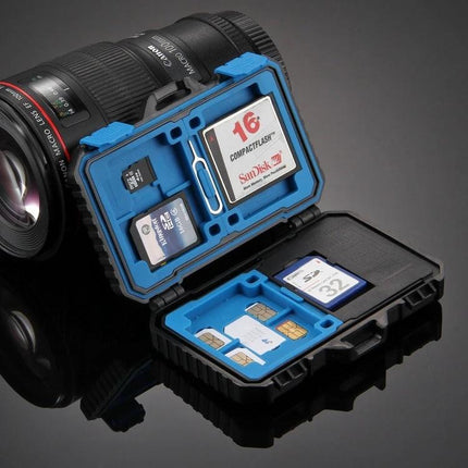 PULUZ 22-in-1 Memory Card Storage Case for SD, CF, and SIM Cards open showing SD, CF, SIM slots and cards with camera lens background