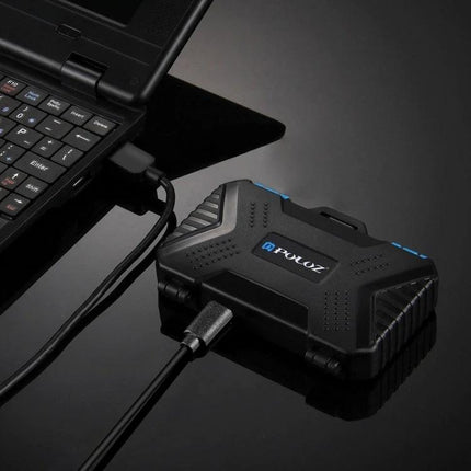 PULUZ 22-in-1 Memory Card Storage Case for SD, CF, and SIM Cards shown connected to laptop via built-in reader, rugged black compact design