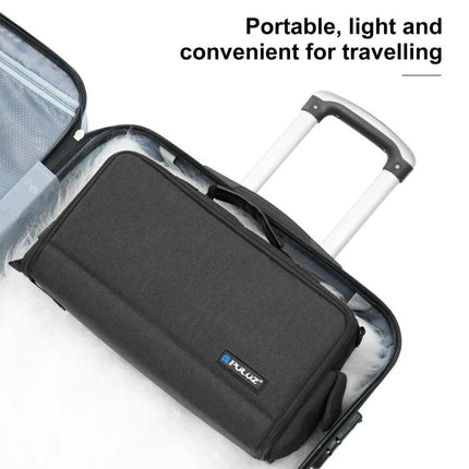 PULUZ Waterproof Camera Crossbody Shoulder Bag for Storage shown packed in suitcase, water-resistant protective camera bag for travel