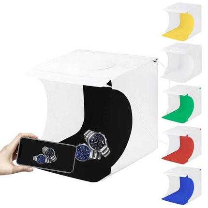 PULUZ Portable Folding Light Box for Small Item Photography showing watch photographed inside black backdrop cube