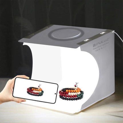 PULUZ Portable Ring LED Light Box for Small Item Photography showing bracelet photo setup with smartphone