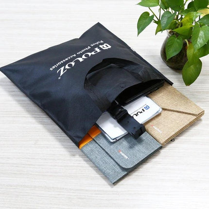 PULUZ Sandbags for Tripod and Light Stand Stability, 46 cm x 46 cm black carrying sandbag with handles holding tablets and accessories