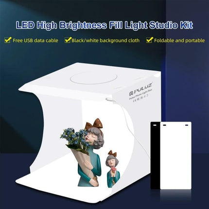 PULUZ Folding Portable Light Box for Small Item Photography showing compact white foldable studio with LED fill light and black/white backdrops