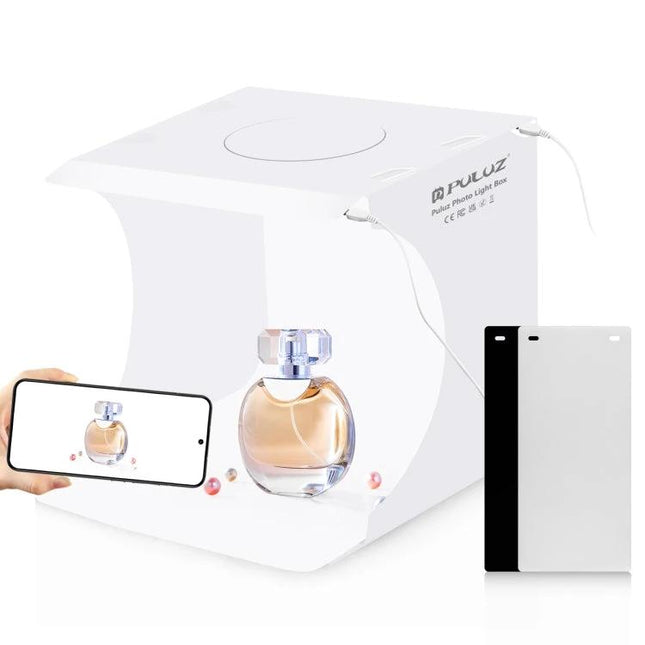 PULUZ Portable Folding Light Box for Small Item Photography showing perfume bottle staged inside mini white studio with LED panels