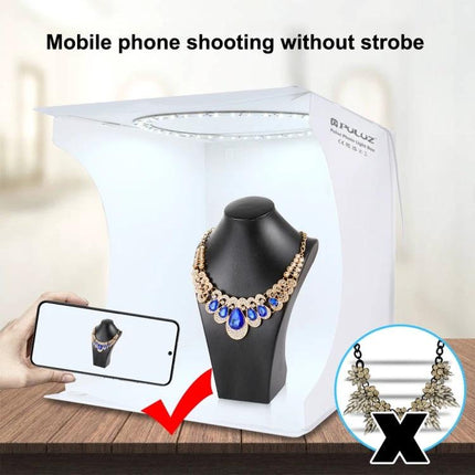 PULUZ 30cm Folding Light Box Kit for Small Product Photography showing jewelry on a bust with mobile phone capturing the shot