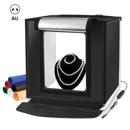 PULUZ 40cm Folding Portable Photo Studio Tent for Smartphone Use showing black tent with jewelry display and background rolls