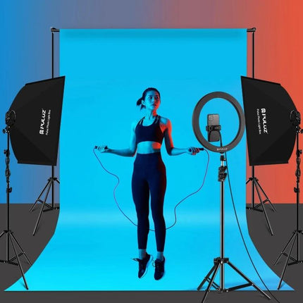 PULUZ Softbox and LED Light Kit for Studio Photography showing softbox, ring light and backdrop with athlete jumping rope
