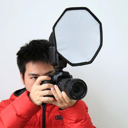 PULUZ 20cm Octangle Foldable Softbox for Flash Photography attached to camera flash diffusing light for portrait and product shots