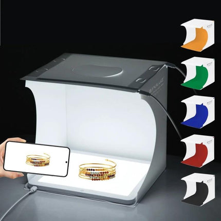 PULUZ Mini LED Light Box for Small Product Photography showing compact foldable studio with jewelry and phone display