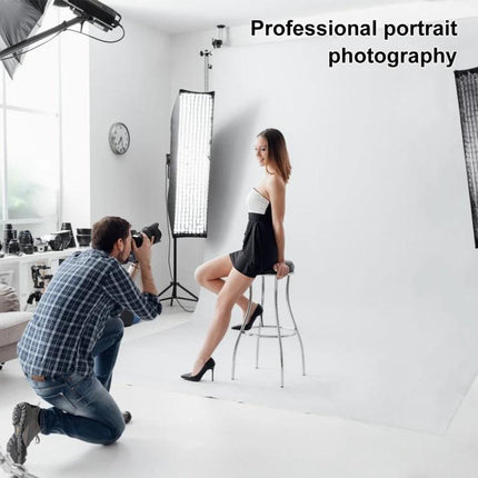 PULUZ 3m x 6m Polyester Photography Studio Backdrop Cloth studio portrait setup with photographer, model on stool and softbox lighting