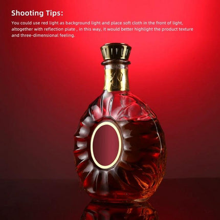 PULUZ 39cm Acrylic Reflective Board for Photography Displays used to shoot a red-backlit perfume bottle with subtle reflection and reduced shadows