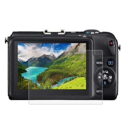 Tempered Glass Screen Protector for Canon and Sony Cameras on a compact camera LCD showing mountain landscape