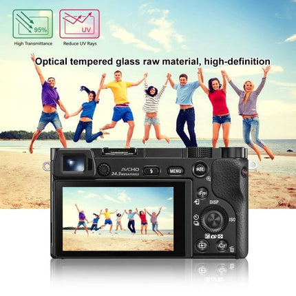 PULUZ Tempered Glass Screen Protector for Sony A6000 Camera showing protector on camera LCD with beach group photo display