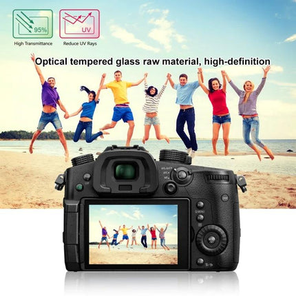 PULUZ Tempered Glass Screen Protector for Panasonic GH5 Cameras shown on GH5 rear LCD displaying group jumping on beach, high-definition 9H scratch resistance