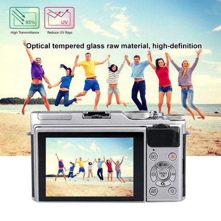 PULUZ Tempered Glass Screen Protector for Fujifilm X-A3 Camera shown on camera back protecting LCD with beach group photo