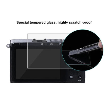 PULUZ Tempered Glass Screen Protector for Fujifilm X-70 Camera installed on X-70 showing scratch-proof 9H tempered glass protecting LCD screen
