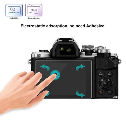 Puluz 9H Tempered Glass Screen Protector for Olympus and Fujifilm Cameras on mirrorless camera touchscreen showing electrostatic no-adhesive installation
