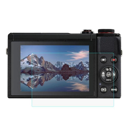 PULUZ Tempered Glass Screen Protector for Canon Cameras installed on camera LCD, shown protecting screen from scratches and fingerprints