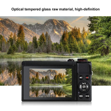 PULUZ Tempered Glass Screen Protector for Canon Cameras on camera showing mountain landscape reflection, protects LCD from scratches and fingerprints