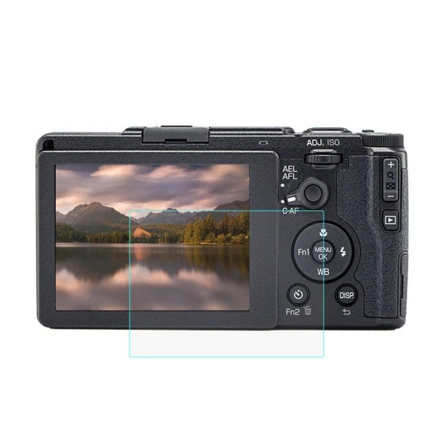 PULUZ 9H Tempered Glass Screen Protector for Digital Cameras on camera LCD showing landscape and protector overlay