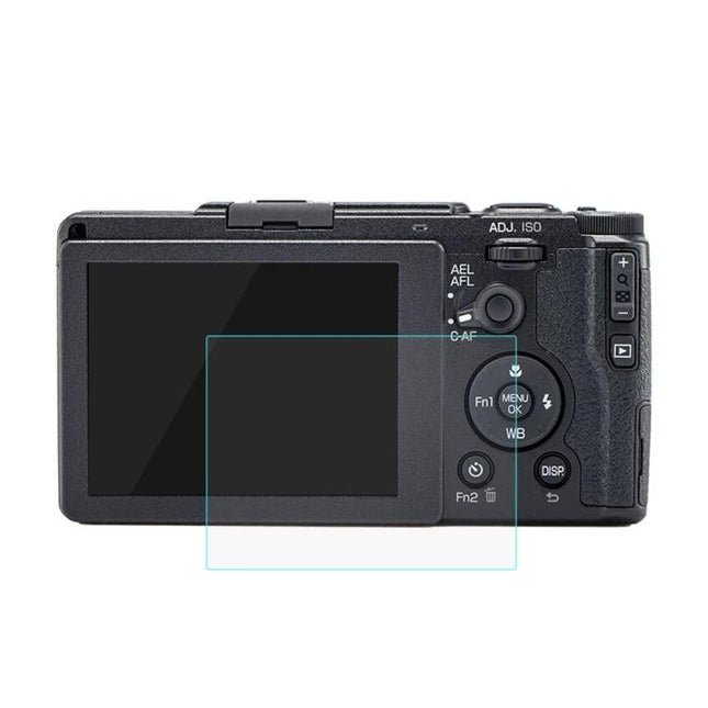 PULUZ 9H Tempered Glass Screen Protector for Digital Cameras shown on a compact camera rear display, clear coverage and anti-fingerprint coating