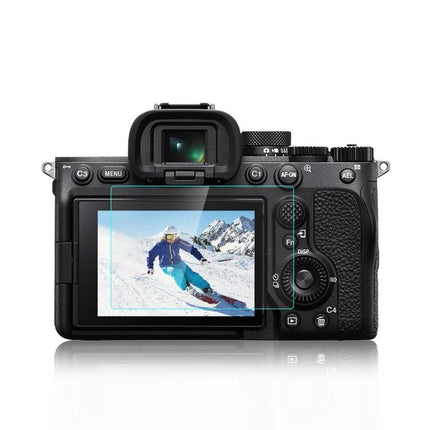 PULUZ Tempered Glass Screen Protector for Sony Alpha 7 IV Camera shown installed on camera LCD displaying skier