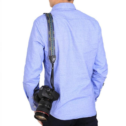 PULUZ Retro Ethnic Style Camera Strap for DSLR Cameras shown worn over shoulder with DSLR camera hanging, vintage patterned supportive neck strap