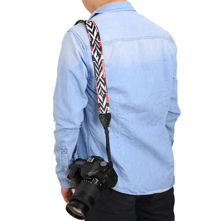 PULUZ Retro Ethnic Style Camera Neck Strap for SLR Cameras shown worn across shoulder on photographer with SLR to prevent drops and reduce neck strain
