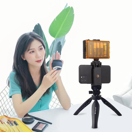 PULUZ Tripod Mount for Stable Smartphone Use on Desks holding phone and LED light on small desk tripod for hands-free video calls and tutorials