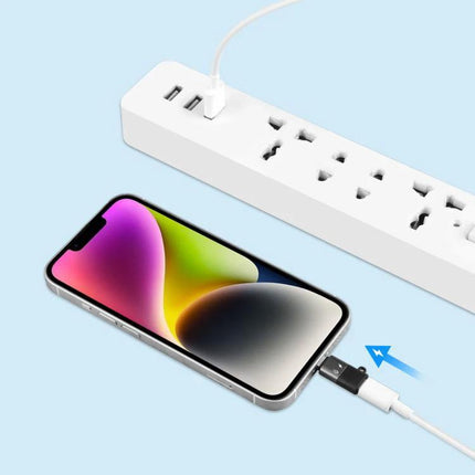 PULUZ USB-C to 8 Pin Adapter for Everyday Device Charging connected to phone and power strip for travel charging and file transfer