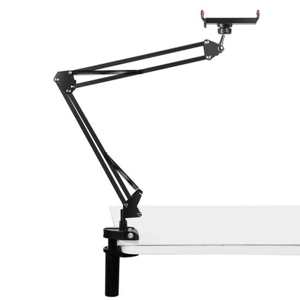 PULUZ Articulating Desktop Arm Holder with Tablet Clamp for Mounting shown clamped to desk holding tablet, adjustable angle and swivel