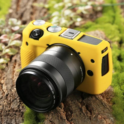 PULUZ Soft Silicone Protective Case for Canon EOS M3 yellow silicone cover on mirrorless camera showing lens and controls