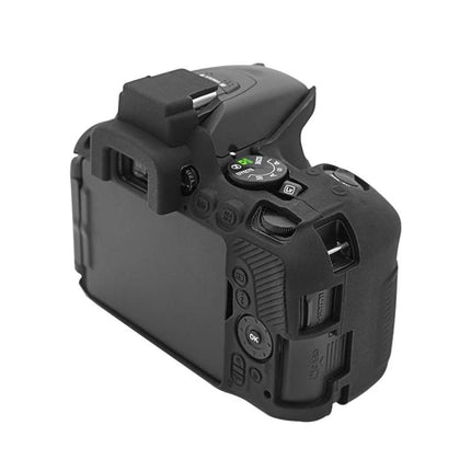 PULUZ Soft Silicone Protective Case for Nikon D5500/D5600 on black Nikon DSLR showing rear controls and LCD, stretchable durable silicone protective cover