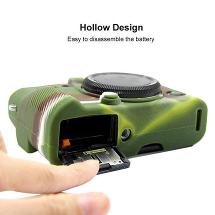 PULUZ Soft Silicone Protective Case for Fujifilm X-T20 Camera in camouflage with hollow battery access showing battery being removed