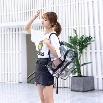 PVC Transparent Waterproof School Backpack Large Purple worn by student model showing clear compartments and reinforced straps
