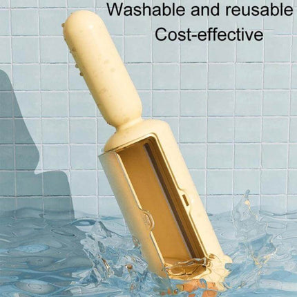 Pet Hair Remover Brush Electrostatic For Clothes And Bedding - washable yellow reusable brush with storage chamber shown in water splash