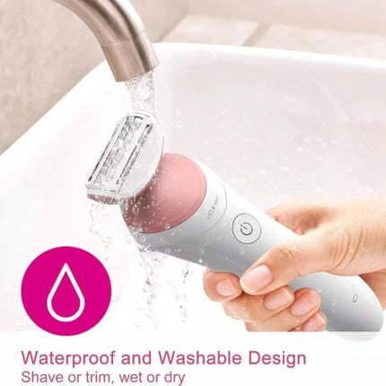 Philips Women's Shaver Replacement Blade for Everyday Grooming - waterproof washable razor head being rinsed under faucet for routine grooming