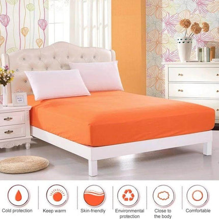 Plain Mattress Protector For Everyday Use Fits 120x200 Cm - Orange fitted protector on bed, elastic edge for secure fit, spill and kid-friendly