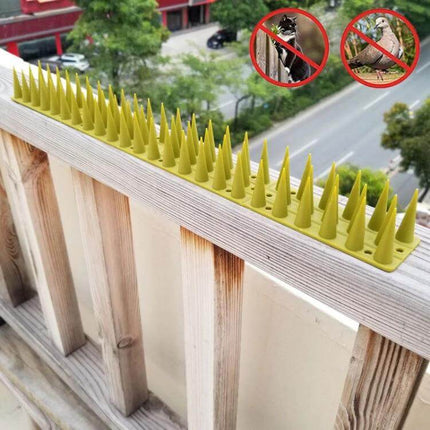Plastic Bird Repellent Thorns Anti Climb Nails for Fences Brown installed on balcony railing to deter birds and climbers