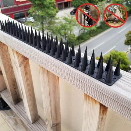 Plastic Bird Repellent Thorns Anti Climb Nails for Fences Brown installed on balcony railing to deter birds and climbers