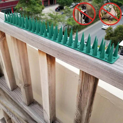 Plastic Bird Repellent Thorns Anti Climb Nails for Fences Brown shown installed on wooden balcony railing to deter birds and climbers