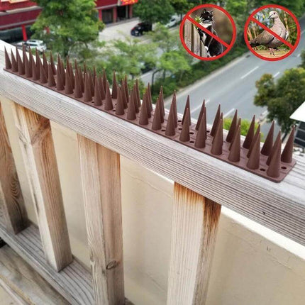 Plastic Bird Repellent Thorns Anti Climb Nails for Fences Brown installed on balcony railing to deter birds and climbers