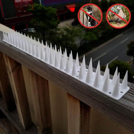 Plastic Bird Repellent Thorns Anti Climb Nails for Fences Brown — Brown PP spikes on fence railing to deter birds and climbers