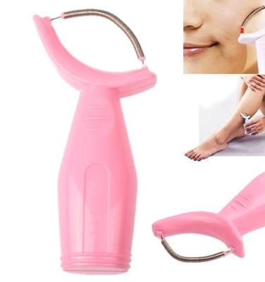 Plastic Face Roller For Gentle Facial Hair Removal - pink plastic body with spring stainless steel mechanism for painless fine hair removal