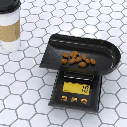 Pocket Jewelry Scale For Everyday Weighing At Home 500g Capacity - compact 0.01g jewelry scale with 304 stainless pan showing beads on digital display