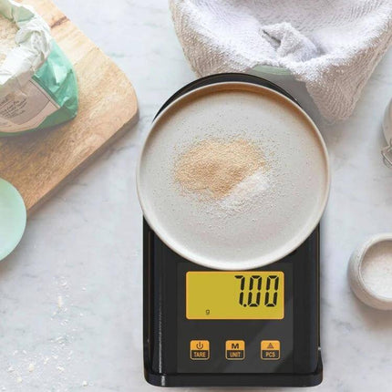 Pocket Jewelry Scale For Everyday Weighing At Home 500g Capacity compact digital scale measuring 7.00g powder on stainless steel pan