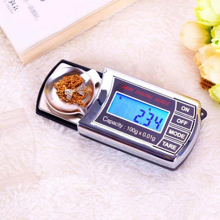 Pocket-Sized Mini Digital Scale For Jewelry And Small Items showing 2.34g backlit LCD, tare function, weighing ring and gold