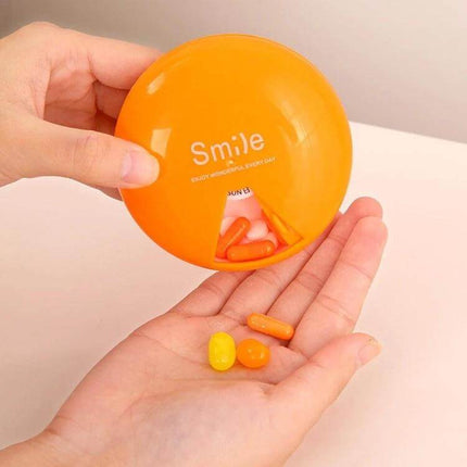 Portable 7-Day Pill Box For Travel And Daily Doses - compact orange weekly pill organizer with covered lid dispensing pills into hand
